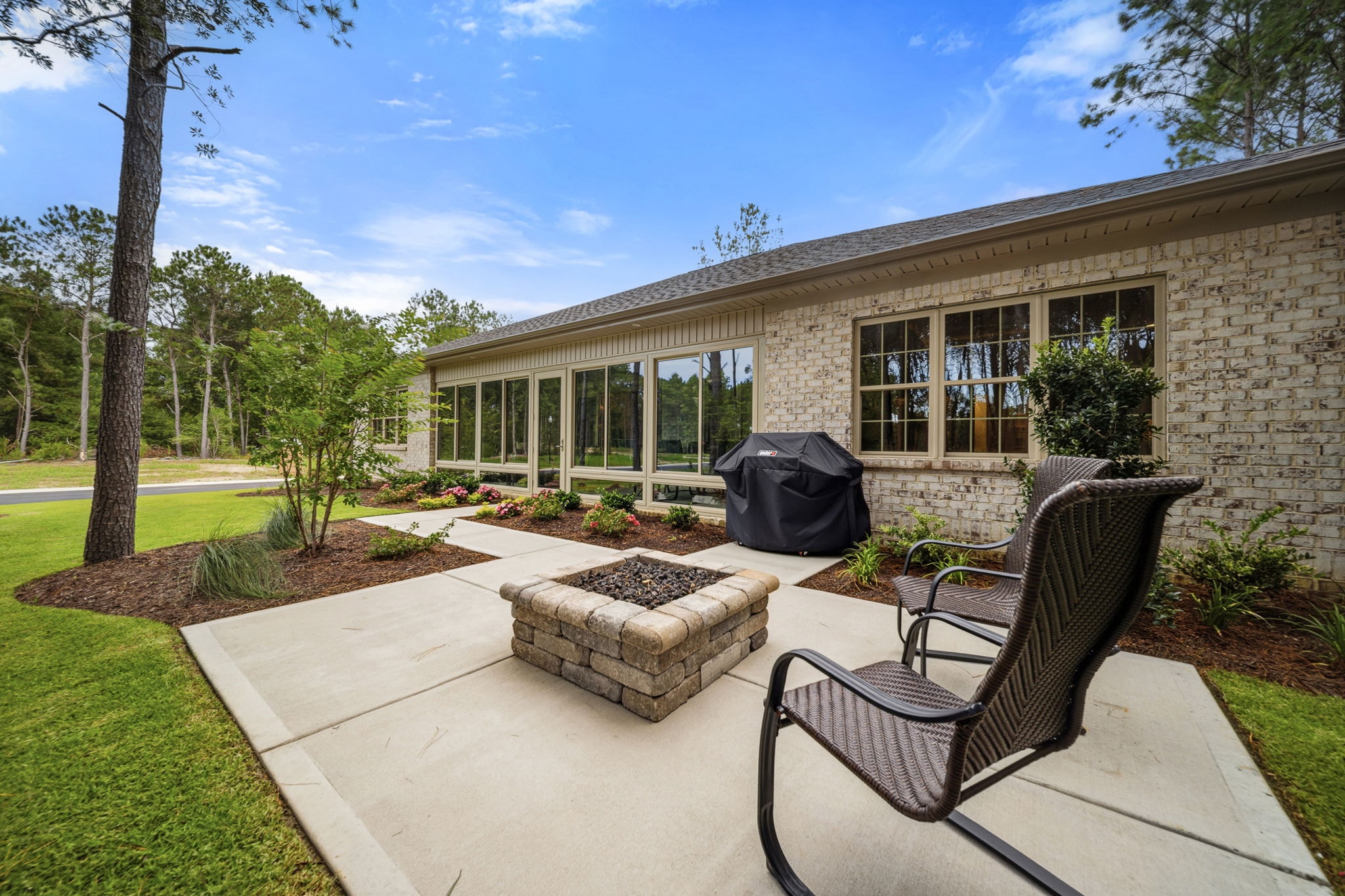 Pine Island backyard patio with fire pit