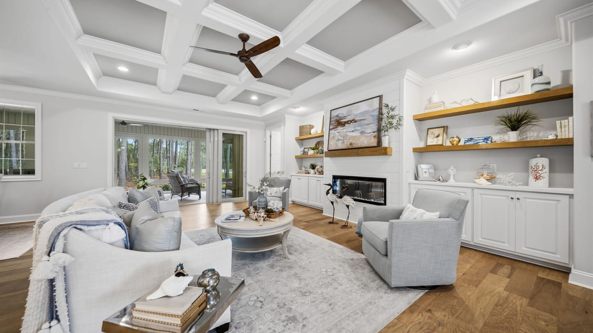 Pine Island living room with fireplace and built-in shelving